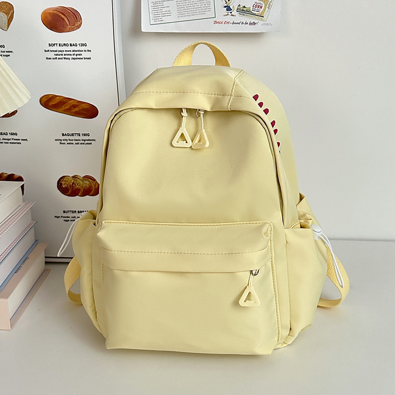 Mochila de gran capacidad para estudiantes de secundaria femenina simple y versátil para estudiantes de secundaria japonesa mochila de diseño