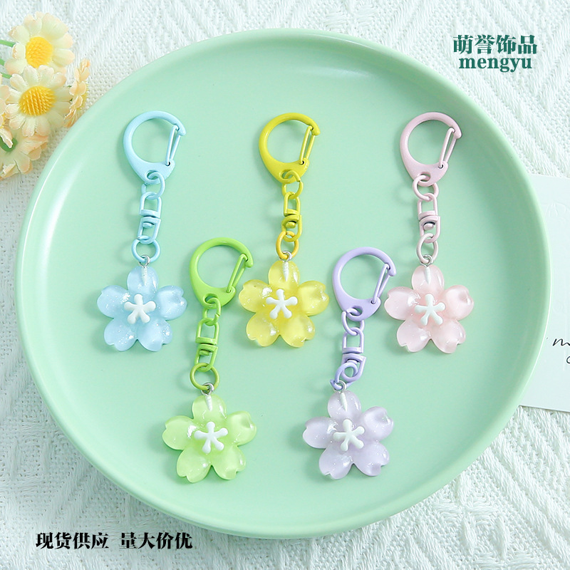 Colorful transparent cherry blossom D-shaped keychain with figure-eight design, fresh and cute, suitable for men's and women's bags, doll pendants, and accessories wholesale Colorful transparent cherry blossom D-shaped keychain with figure-eight design, fresh and cute, suitable for men's and women's bags, doll pendants, and accessories wholesale