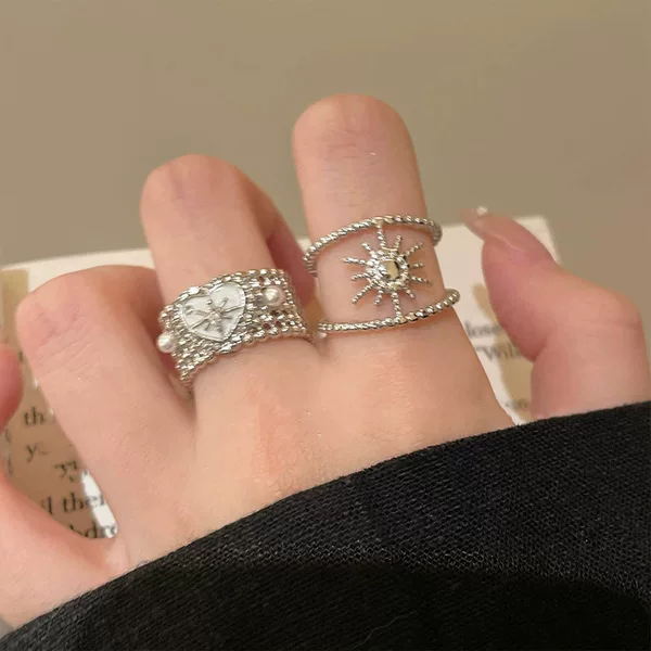 Heart-shaped, wide-band, minimalist pearl six-pointed star ring, adjustable opening, stylish design for women, exuding a sophisticated and elegant vibe
