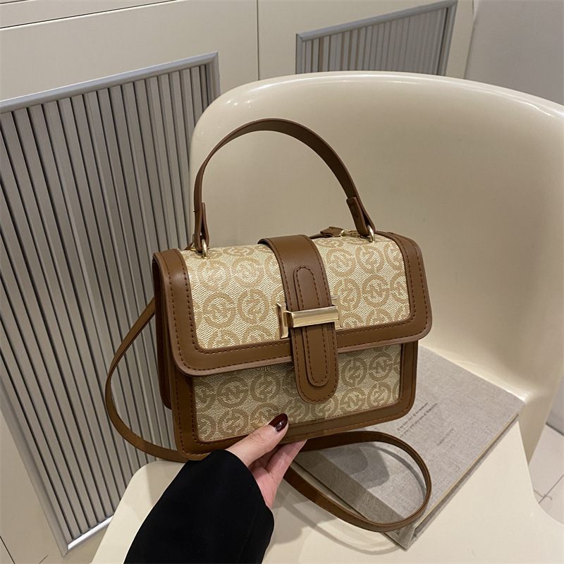 Bolsa de mano de moda coreana de moda 2025, primavera nueva bolsa de hombro de viaje de moda retro impresión mochila