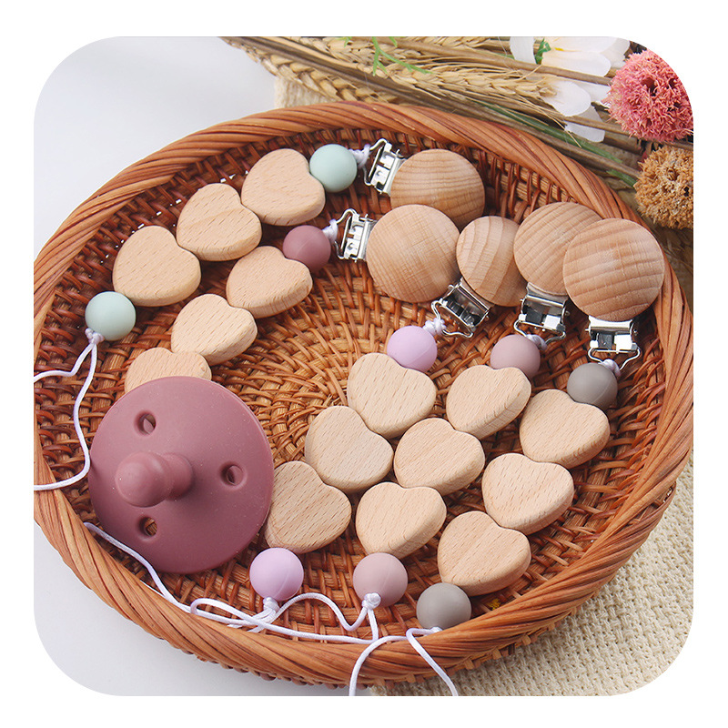 Productos para bebés y niños pequeños clip de tetina creativo caricatura bebé amor de beech mordida de dientes molares tetina cadena de prevención