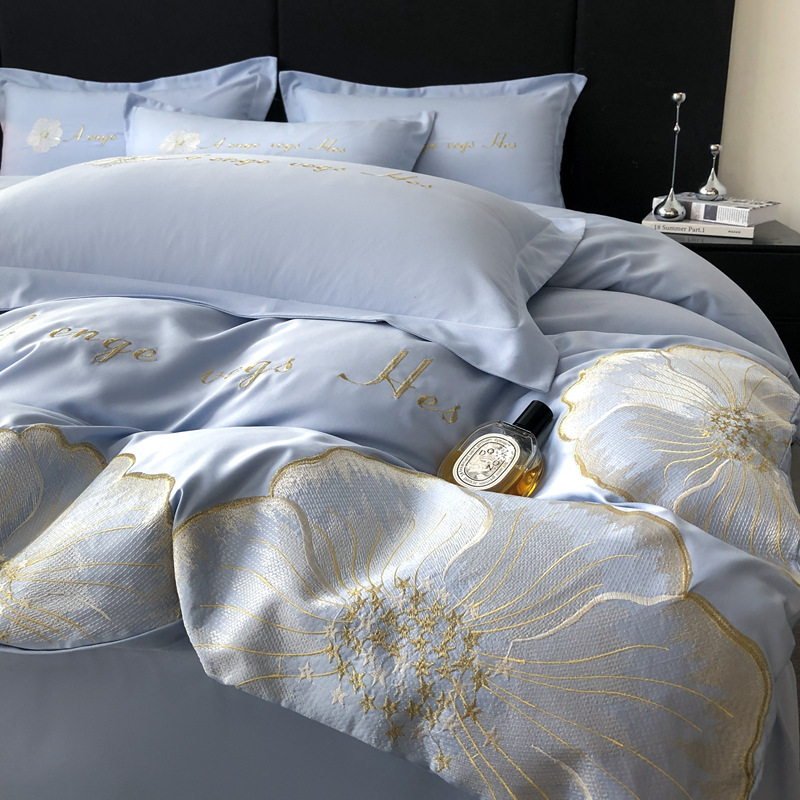 Nuevo traje de cuatro piezas con bordado de seda lavado, sábana de viento de lujo ligero, color sólido, sábana simple, funda de edredón al por mayor