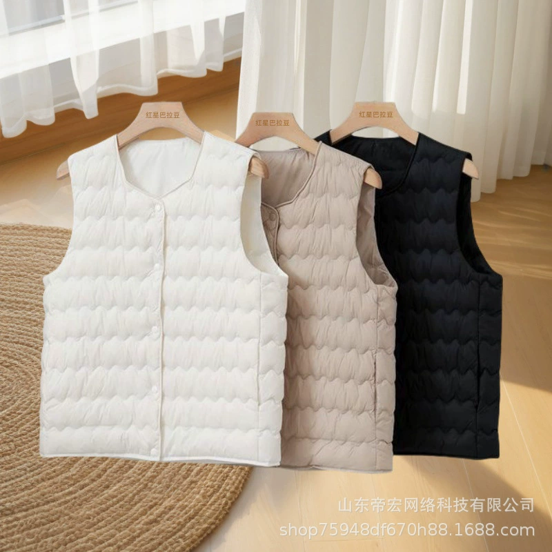 Женский укороченный пуховый жилет из хлопка с круглым вырезом для осени и зимы 2024 года, теплый и стильный, универсальный и элегантный, приталенный крой.