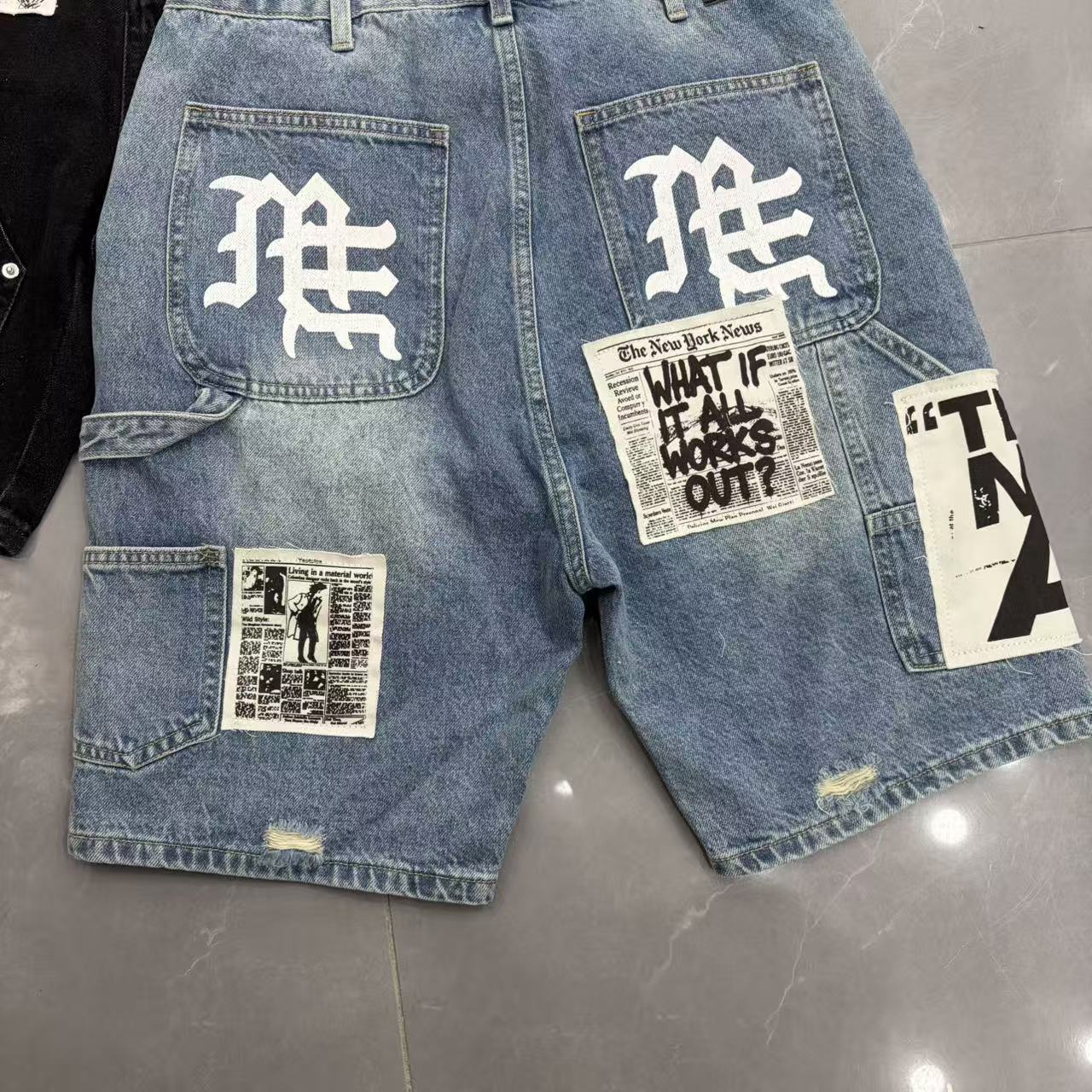 Unisex patchwork distressed denim Bermuda shorts detail 6