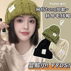 ウールの帽子の子供の秋冬の韓国版の潮網の赤い保温のニットの帽子の大きい頭は韓国のファッションの純色を囲んで顔の小さい冬を現します。