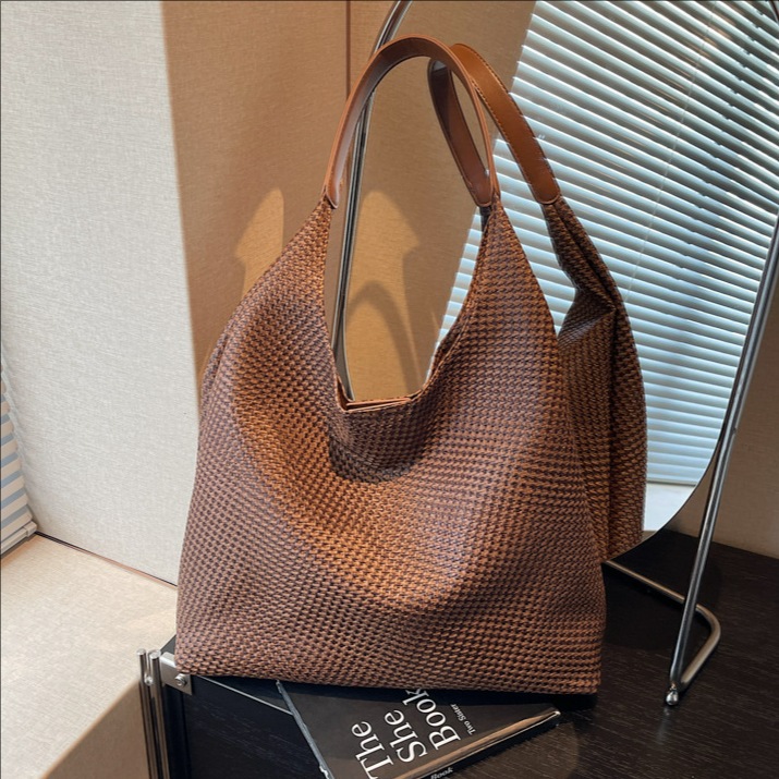 Bolso de comercio exterior de nicho de mujer retro tejido estriado bolso de mujer 2025 nuevo bolso de mano ocio de hombro bolso
