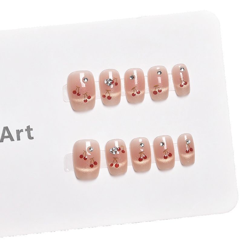 Nuevos productos de primavera y verano, ojos de gato, uñas de vestir de cereza francesa, blanco, corto, lindo parche de uñas de cereza tridimensional, uñas