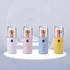 新型タイガー補水器七色灯アニメ萌え蒸し顔美容噴霧器充電携帯手持ち補水器
