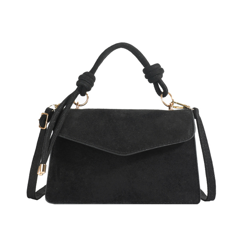 2024 otoño y invierno temperamento diseño de moda de un solo hombro aire extranjero color sólido retro textura simple bolso portátil