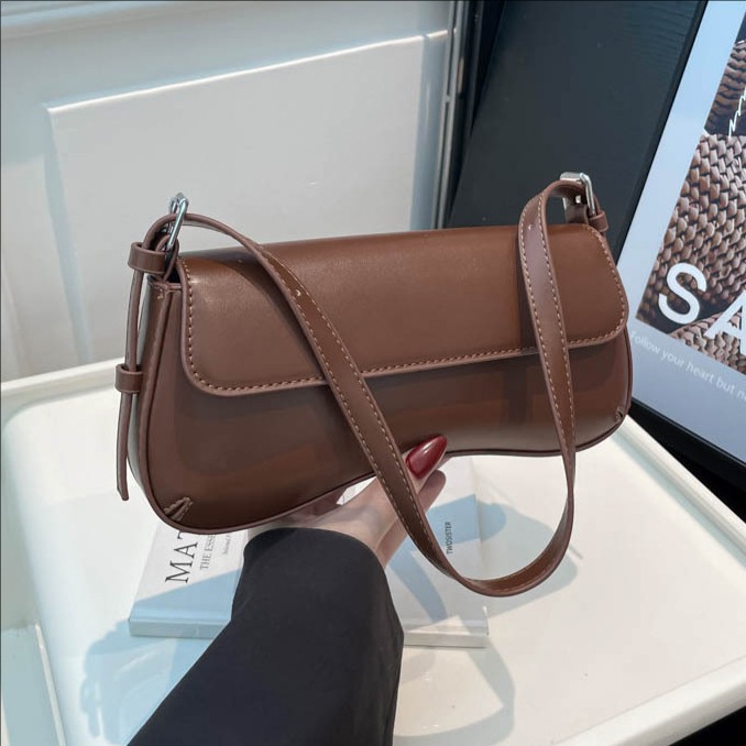 Transfronterizos de alto nivel bolso retro bolso de brazo para mujeres otoño y invierno 2025 nueva moda simple bolso de hombro de viaje