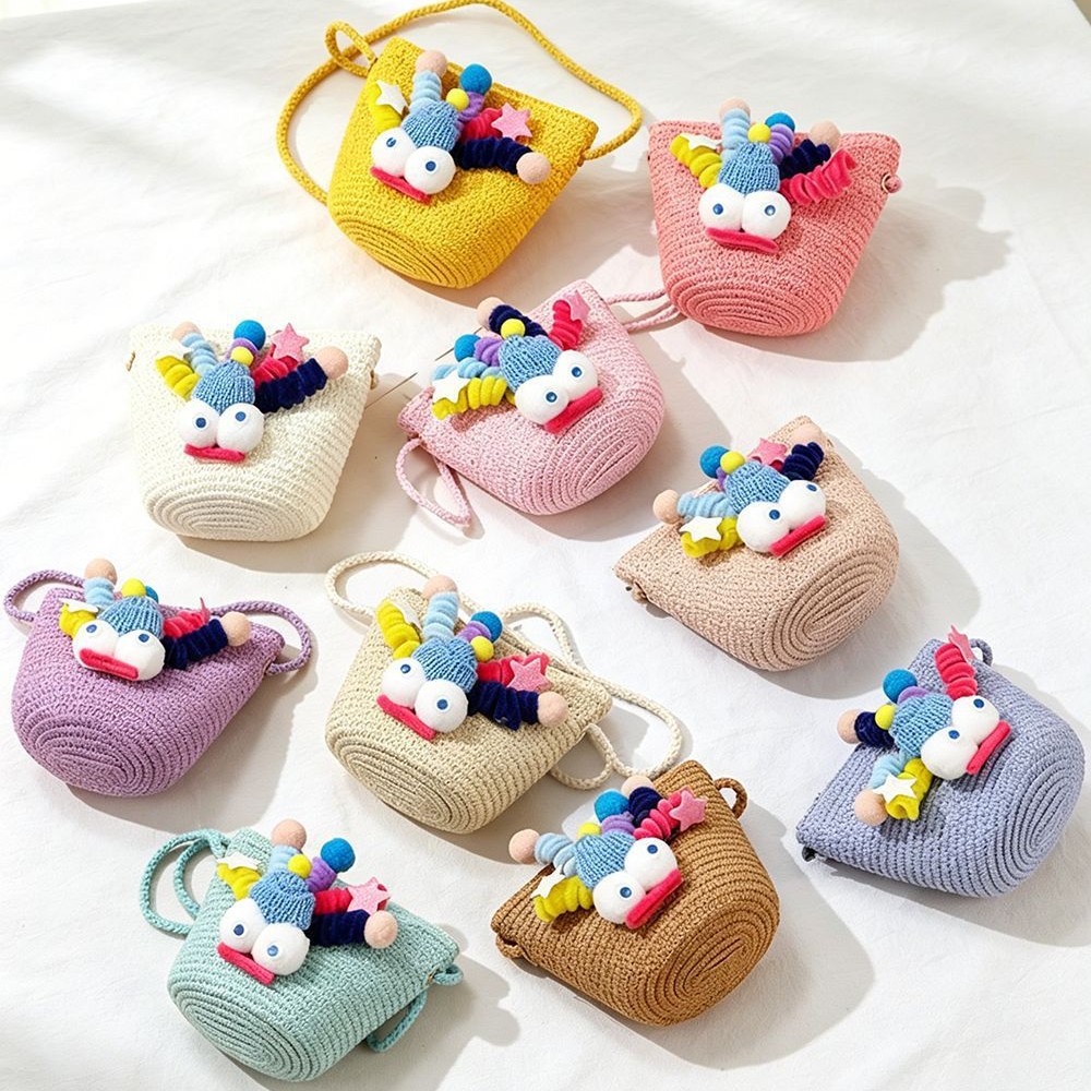 Spring and summer big-eyed doll straw woven small flat bag, woven children's outdoor travel shoulder bag, coin purse, phone bag