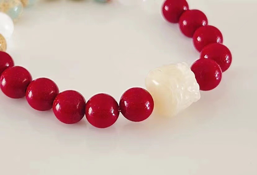 Natural white jade Bodhi Root Lion Dance cinnabar bracelet for women, a niche high-end accessory. Kunlun white jade Shoushan stone bracelet, 128 Item Picture