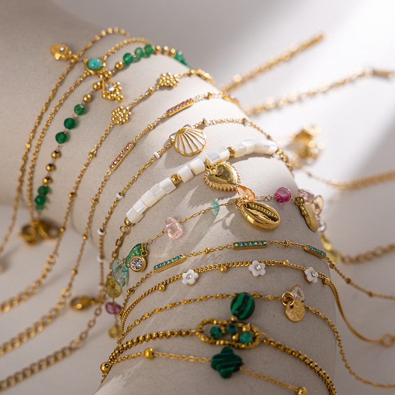 Tena 18k chapado en oro, alta retención de color, pulsera de acero de titanio, accesorios de mano de concha de piedra natural de alta calidad para mujer