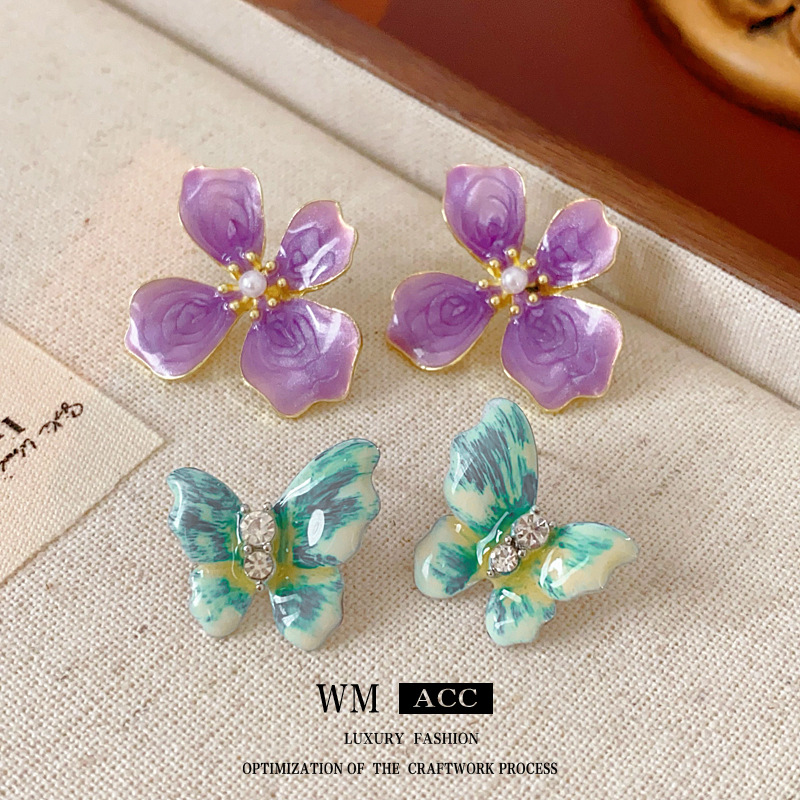 Pendientes de mariposa de aceite de gota de diamante con aguja de plata vintage de segunda mano, lujo ligero, sentido de alta gama, pendientes de moda de temperamento francés, mujeres