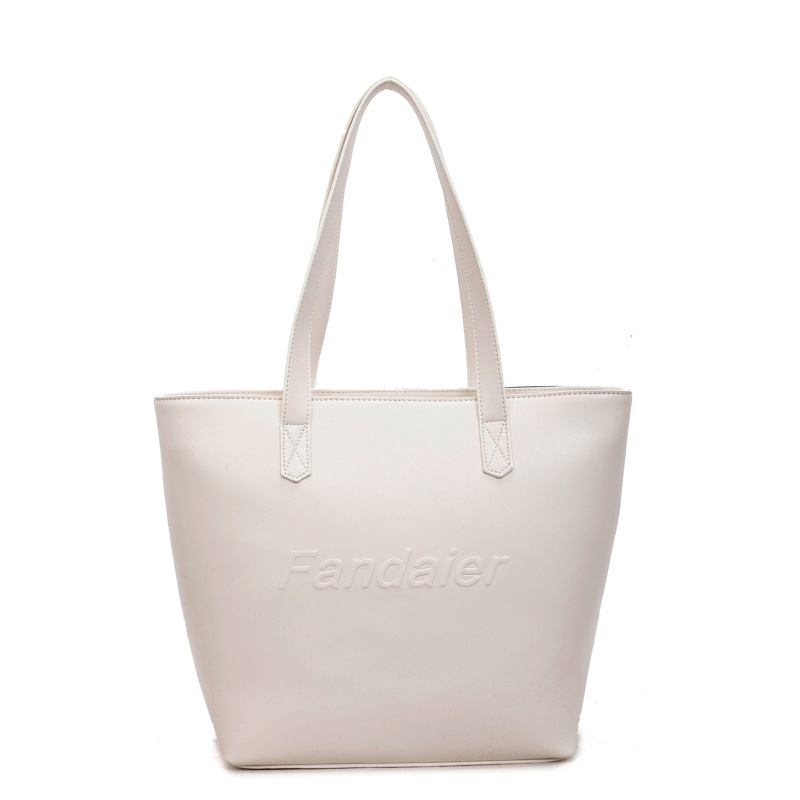 Casual gran capacidad bolso tote para mujeres 2026 venta caliente nueva ciudad simple moda versátil bolso de hombro axilar