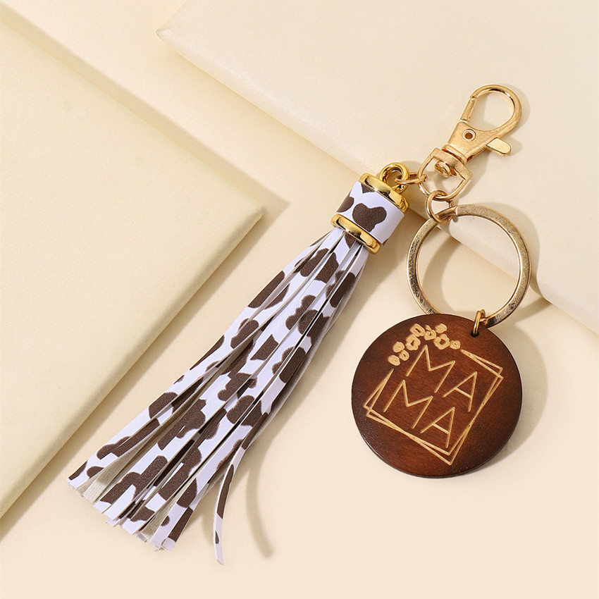 17g Weight Keychain Classification 1 Piece Quantity Casual, Holiday, Daily Occasion Pu Leather Material Mother'S Day Festival Letter, Tassel Pattern Unisex Gender Modern Style Style Modern Style Letter Tassel Pu Leather Mother'S Day Unisex Keychain 31