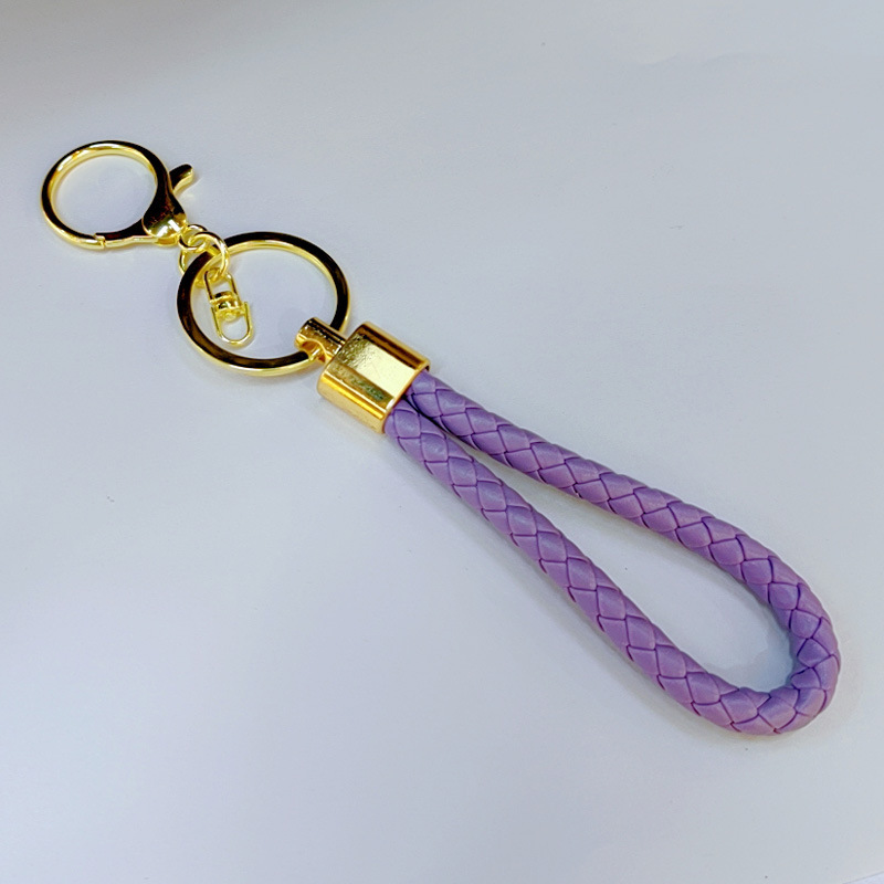 Ronda de la langosta hebilla PU cuero trenzado cuerda llavero hombres y mujeres amor llavero mano cuerda bolsa cordón fábrica directa al por mayor