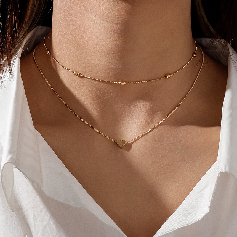 European and American cross-border jewelry simple trendy women's street shooting necklace copper peach heart multi-layer clavicle necklace Amazon hot sale