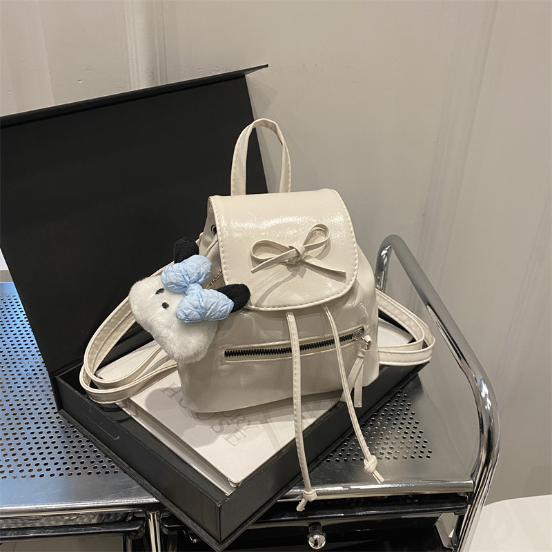 Mochila de nicho coreana para mujer, verano 2024, nueva mochila de moda, bolso de cubo portátil de un solo hombro de todo fósforo