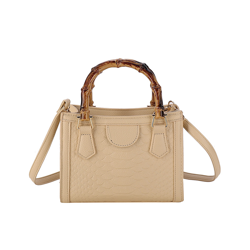 Europa y los Estados Unidos retro bolsos transfronterizos mujeres 2024 nueva moda simple bolsos de mano casuales cocodrilo mochila pequeña