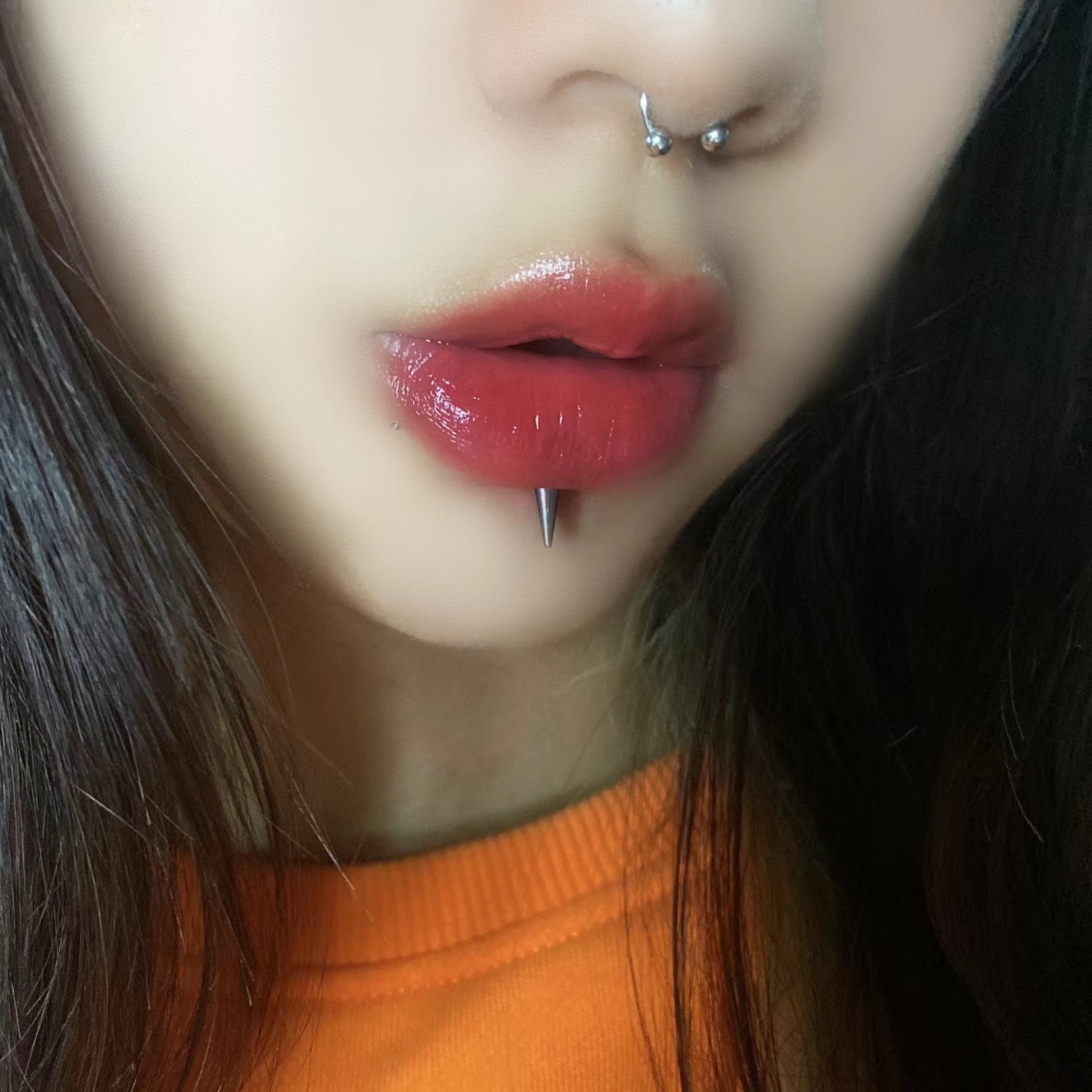Silver pointed spike labret stud material detail