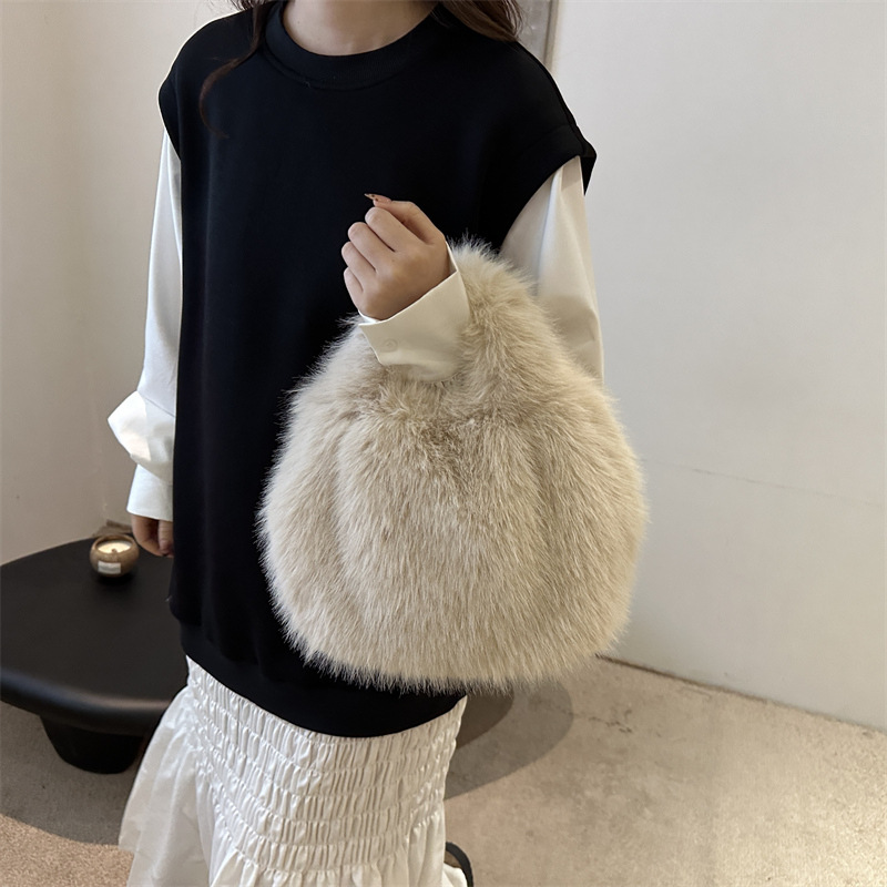Bolsa de mano para mujeres nuevo estilo de peluche de color sólido simple y popular bolsa de lana de aire exterior temperamento casual textura de viaje de hombro