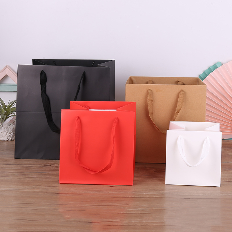 现货白卡纸正方形纸袋红色黑色方底袋桶装蛋糕袋子玩具礼盒袋子
