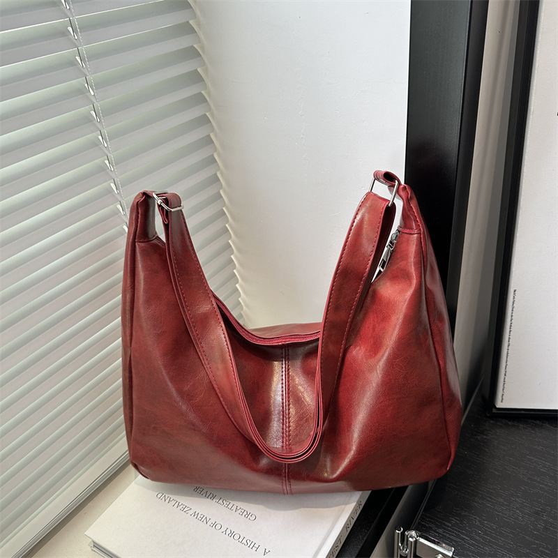 Moda de viaje de moda de gran capacidad bolsas de color sólido para mujeres 20 simple retro nuevo hombro bolsas coreanas transfronterizas