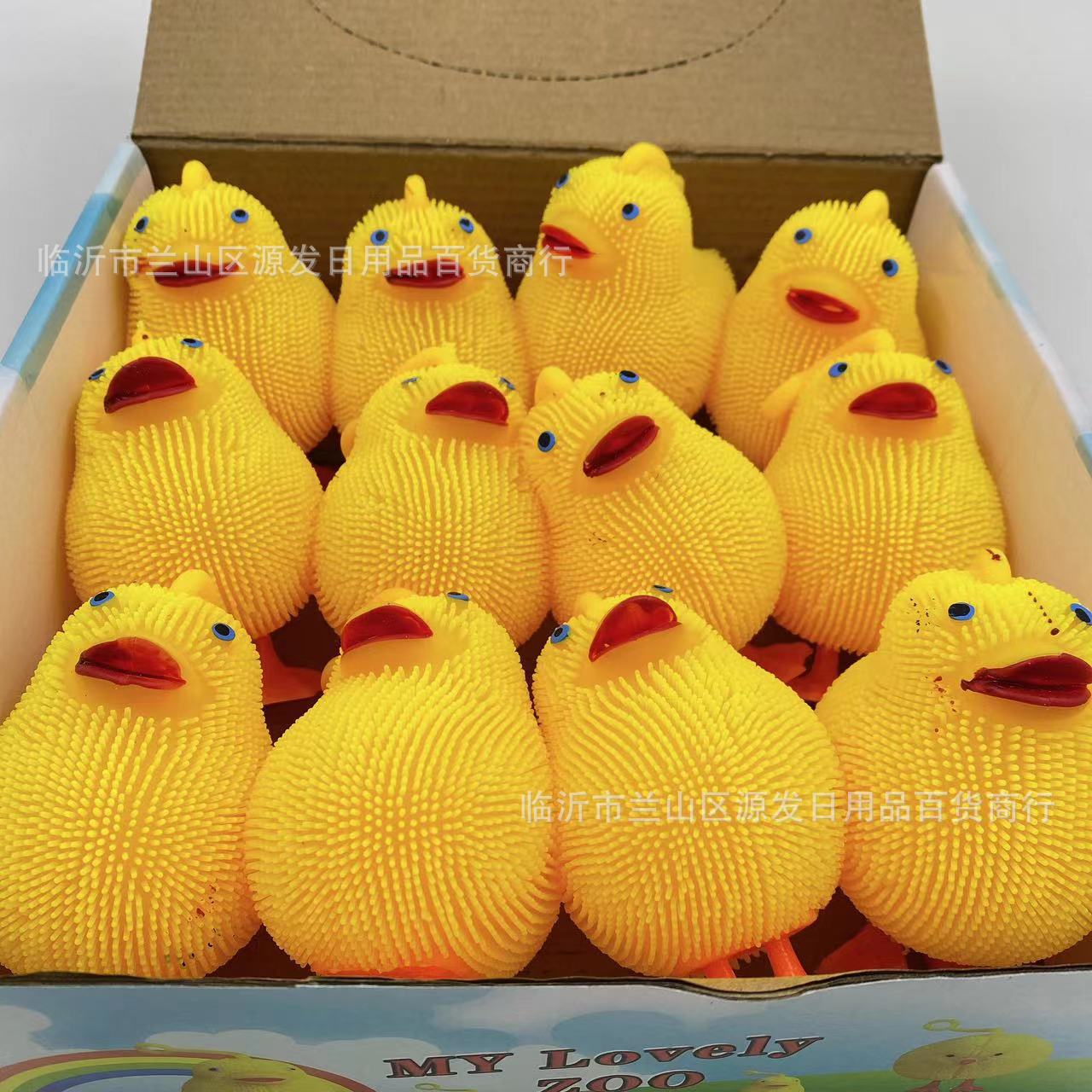 Juguete de dibujos animados flash emisor de luz pato amarillo emisor de luz bola de piel honda pato pollo pellizco música descompresión solución