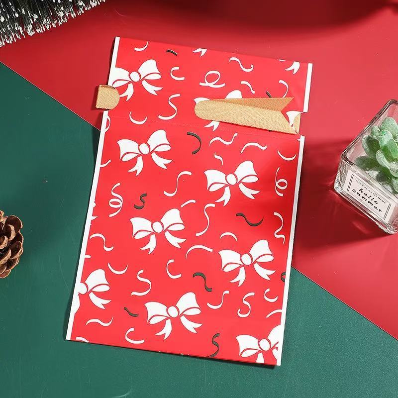 大型の新作越境ECクリスマスギフト包装袋、リボン付き巾着袋、キャンディバッグ、アップルバッグ、23cm*34cm|undefined