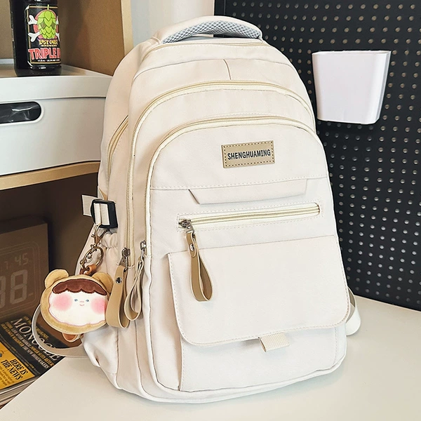 White backpack, doll