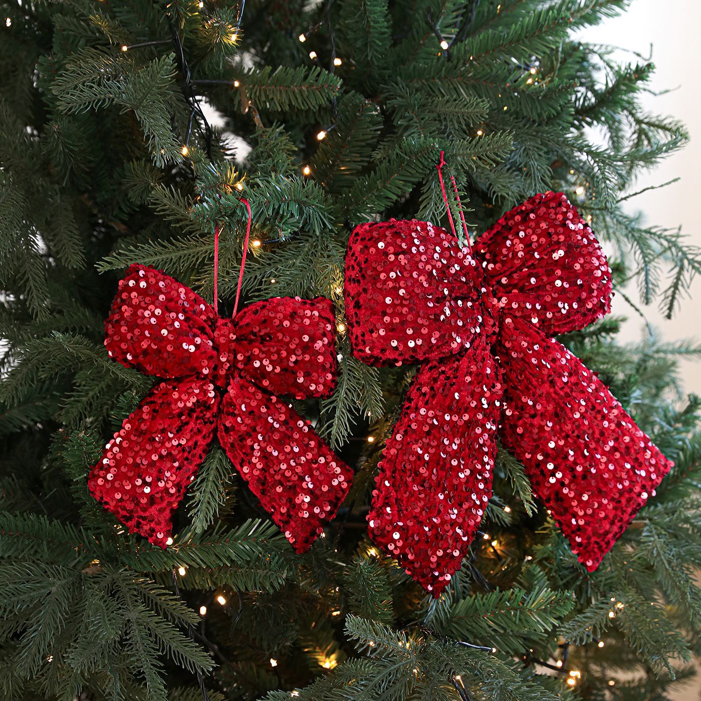 Vin de tela transfronteriza mariposa de Navidad roja sequinilla de brillo de alto nivel colgante de árbol de Navidad accesorios de decoración