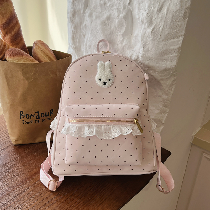Nuevo estilo coreano dulce simple mochila pequeña mochila de conejo punto ondulado lindo mochila de alto valor de la cara fuera de la mochila de estudiantes de viaje