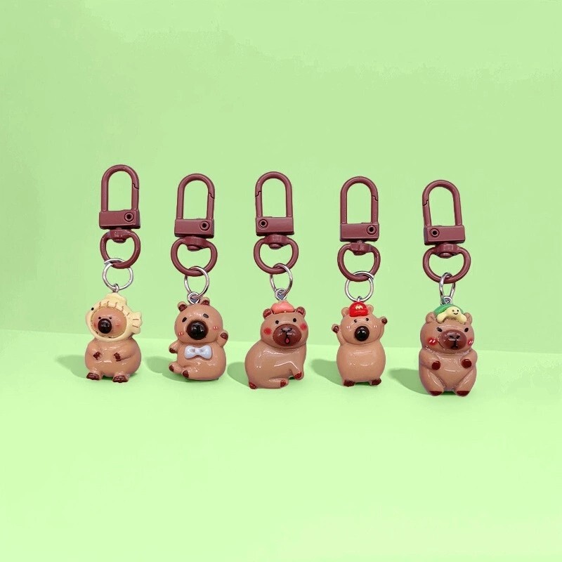 Capibala luminous key chain cute student schoolbag pendant key ring luminous capybara doll resin pendant