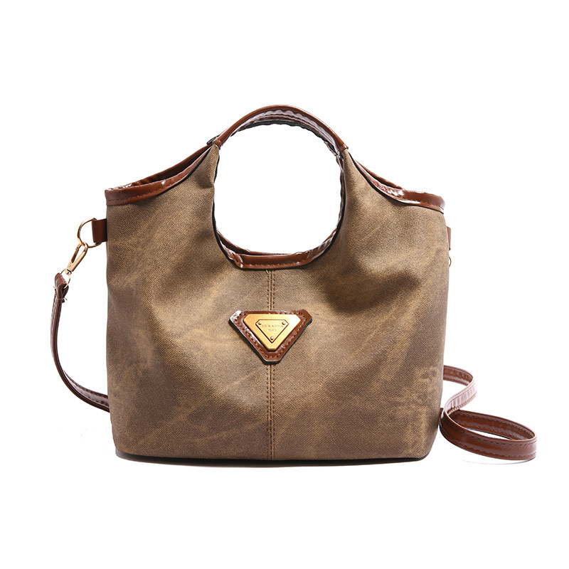 Bolso de mano de textura para mujeres 2024 otoño y invierno nuevo estilo retro de moda empalme de gran capacidad de viaje de hombro bolso de mujer