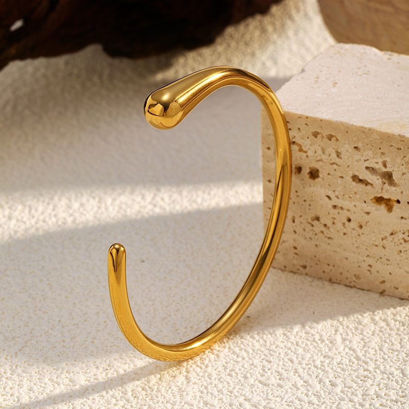 2024 pulsera abierta de fundición de acero inoxidable, pulsera de textura redonda, joyería de acero de titanio de oro de 18 quilates al por mayor
