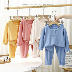 子供の徳の絨毛の骨のない家庭服のスーツの女の子の秋の服の秋のズボンのパジャマの男の子の赤ちゃんの保温の下着の2つのセット