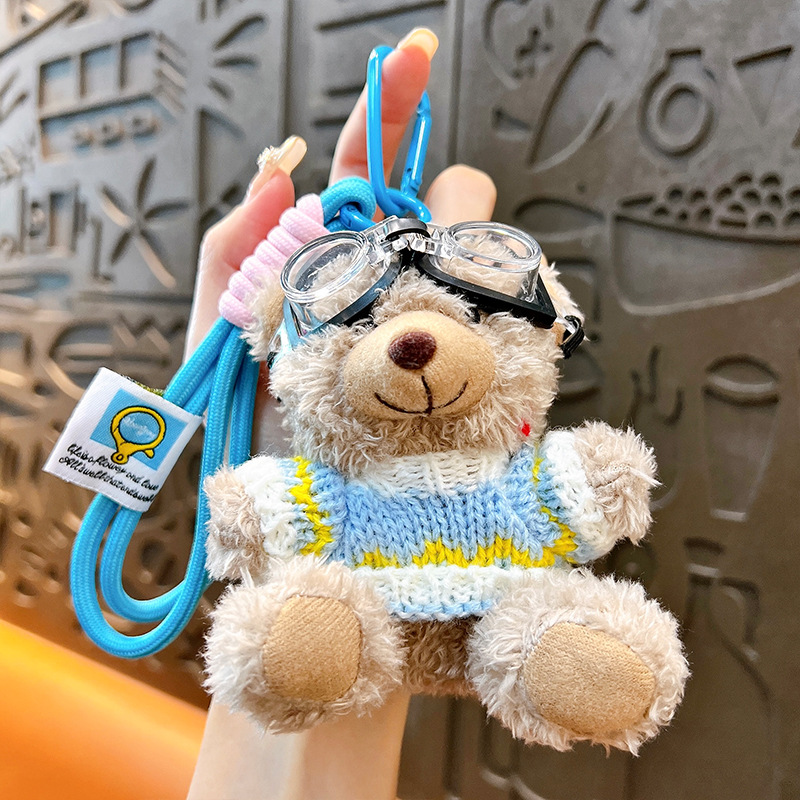 Creativo felpa marea cool oso estudiante mochila colgante muñeca linda pareja llavero pequeño regalo de dibujos animados al por mayor