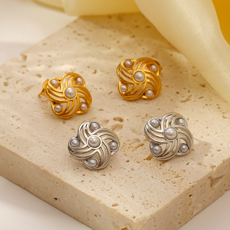 La moda europea y americana incrusta molino de viento de perlas en forma de pendientes de acero inoxidable de estilo femenino de alto nivel lujo ligero 18K pendientes