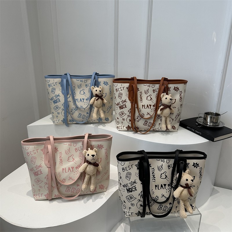 Cute casual oso estampado de gran capacidad 2024 nuevo estilo simple viajero de un solo hombro bolso portátil para estudiante bolso femenino