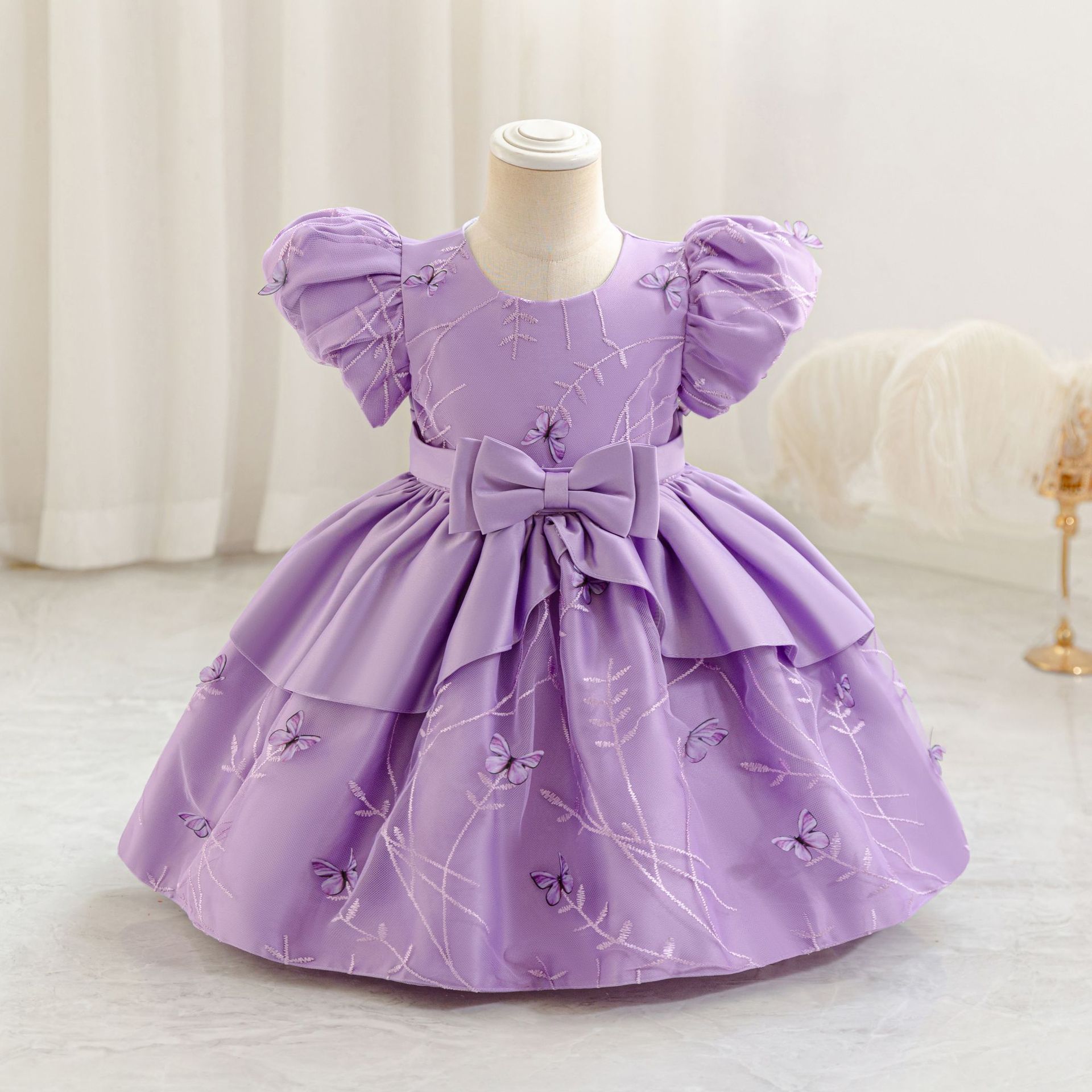2025 nuevo bebé transfronterizo vestido infantil ropa de abrigo de arco vestido de bebé vestido vestido de abrigo al por mayor