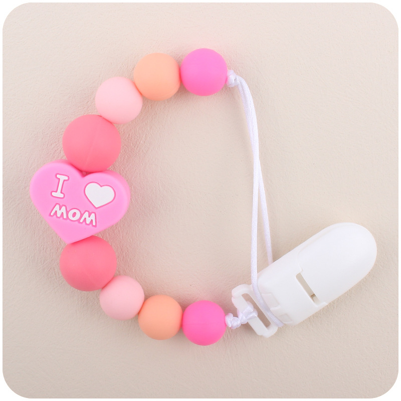 Bebé de dibujos animados amor dos lados mamá papá silicona mordedor calmante bebé chupete cadena a prueba de mordedura