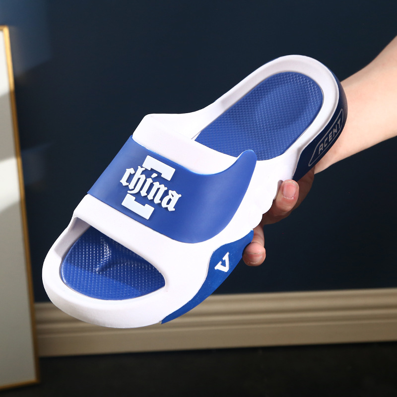 Zapatillas de los hombres de verano zapatillas de estilo coreano de moda ropa personalizada al aire libre baño grueso zapatillas de fondo de los hombres al por mayor