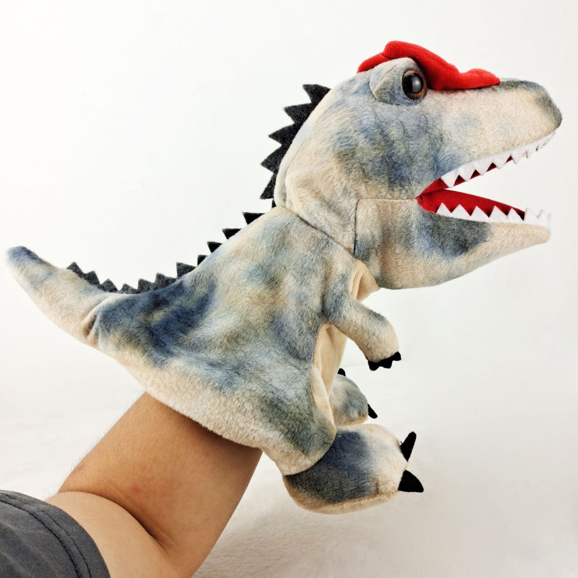 Dragón año dinosaurio en stock juguete de peluche Canglong animal educativo muñeca de títeres kindergarten historia contando apoyos muñeca