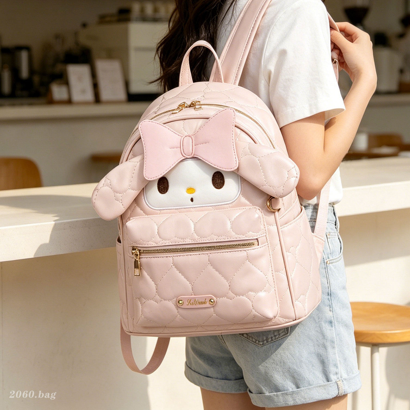 Mochila de gran capacidad para estudiantes de verano 2026 nuevo dulce arco versátil Mochila de alta calidad