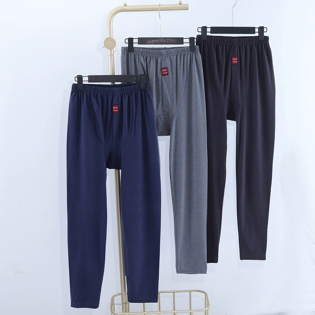 Производитель мужских термобрюк для весны и осени продает базовые штаны, флисовые штаны, термобрюки из чистого хлопка для мужчин среднего и старшего возраста, удобные и теплые.