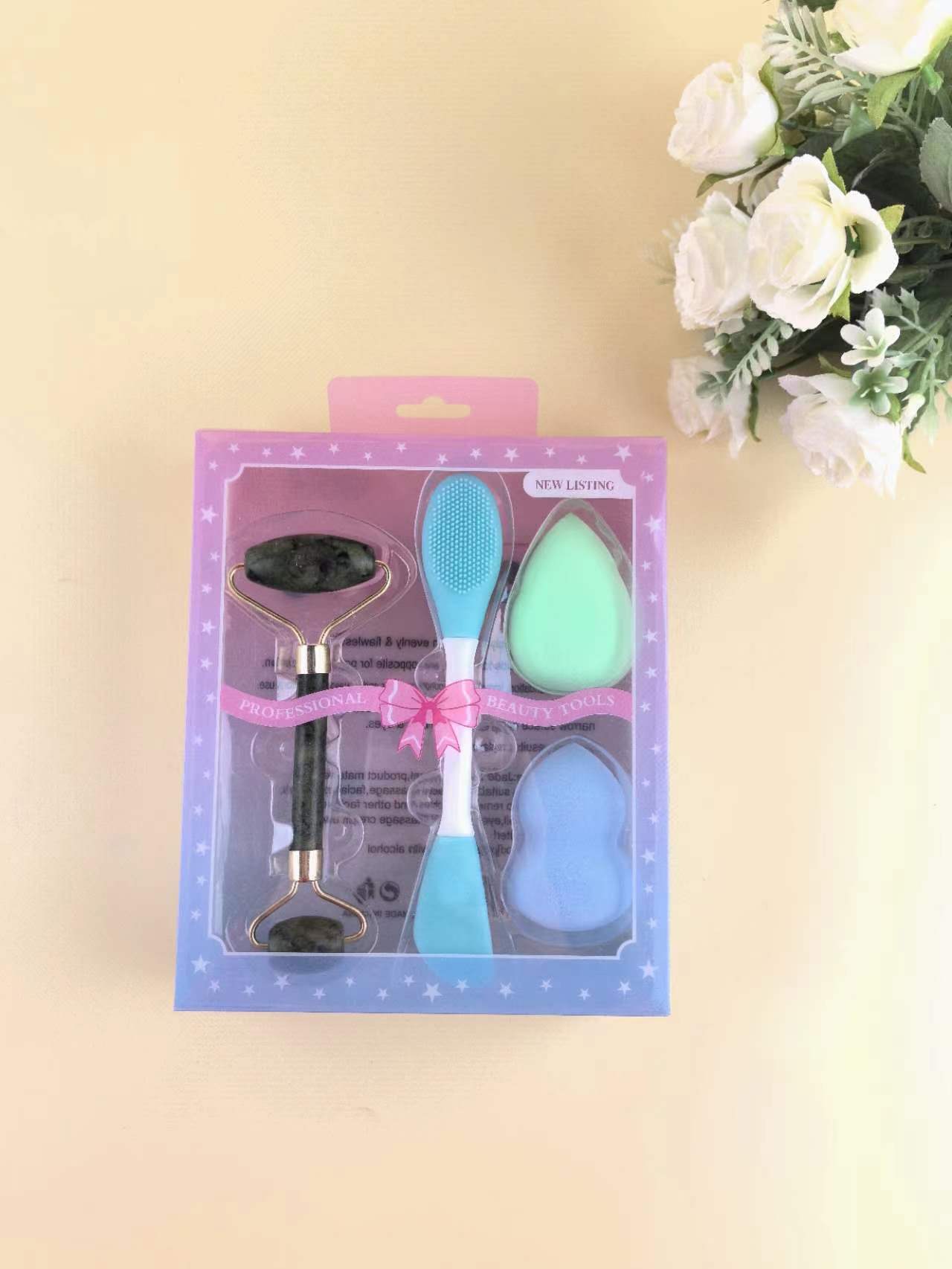 Boutique transfronteriza herramientas de belleza maquillaje huevo y máscara cepillo masaje palo combinación máscara de silicona cepillo facial