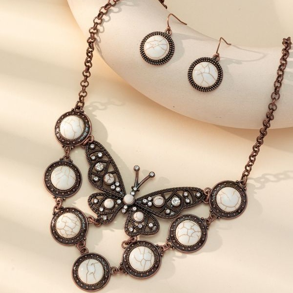 Venta caliente transfronteriza Europea y Americana exagerada Bohemia vintage turquesa mariposa collar pendientes traje de fábrica de joyas al por mayor