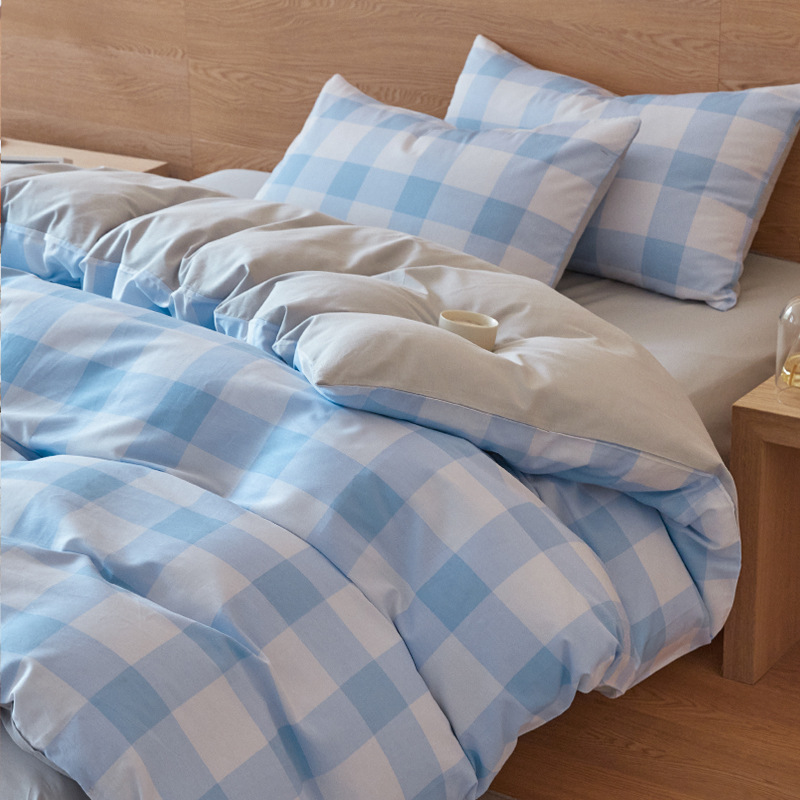 Nuevo traje de cama de algodón lavado de algodón de cuatro piezas de algodón 2025 nuevo traje de dormitorio de funda de edredón de sábana simple de tres piezas