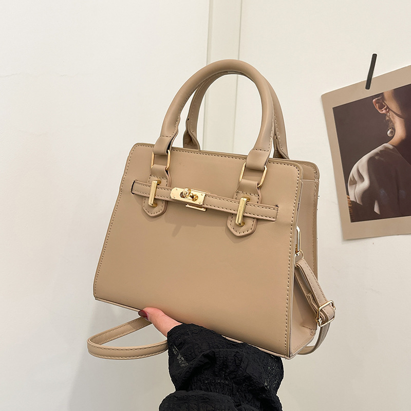 Bolso Kelly portátil retro simple para mujer 2025 primavera y verano nuevo bolso de hombro de moda bolso de mensajero de viaje de moda